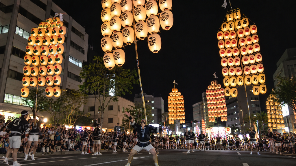 Akita Kanto Festival performers balancing illuminated lantern poles at night